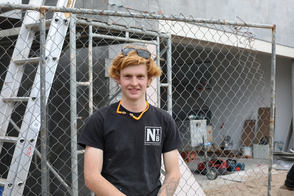 Jayden Atkins working in construction